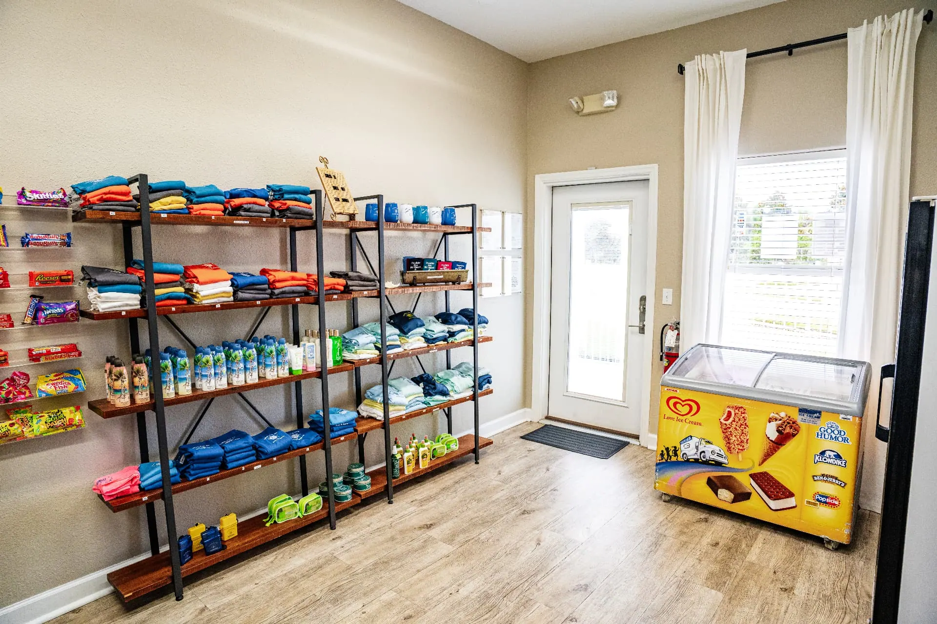 On-site general store stocked with apparel, snacks, sunscreen, and ice cream