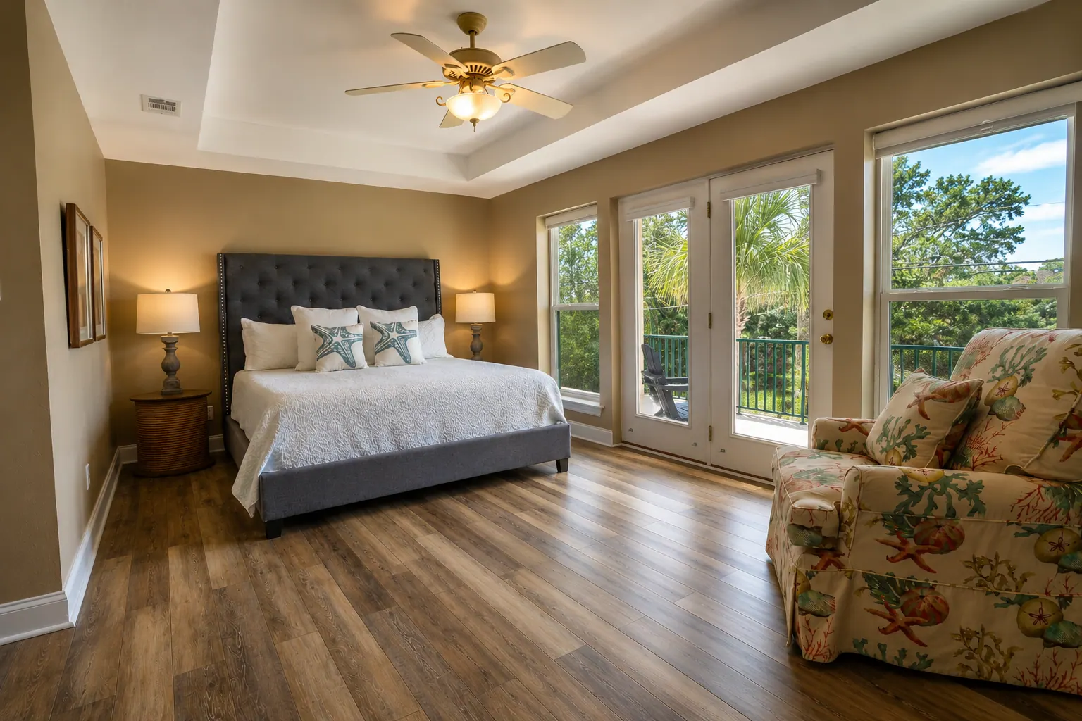 Cozy furnished condo bedroom with balcony views